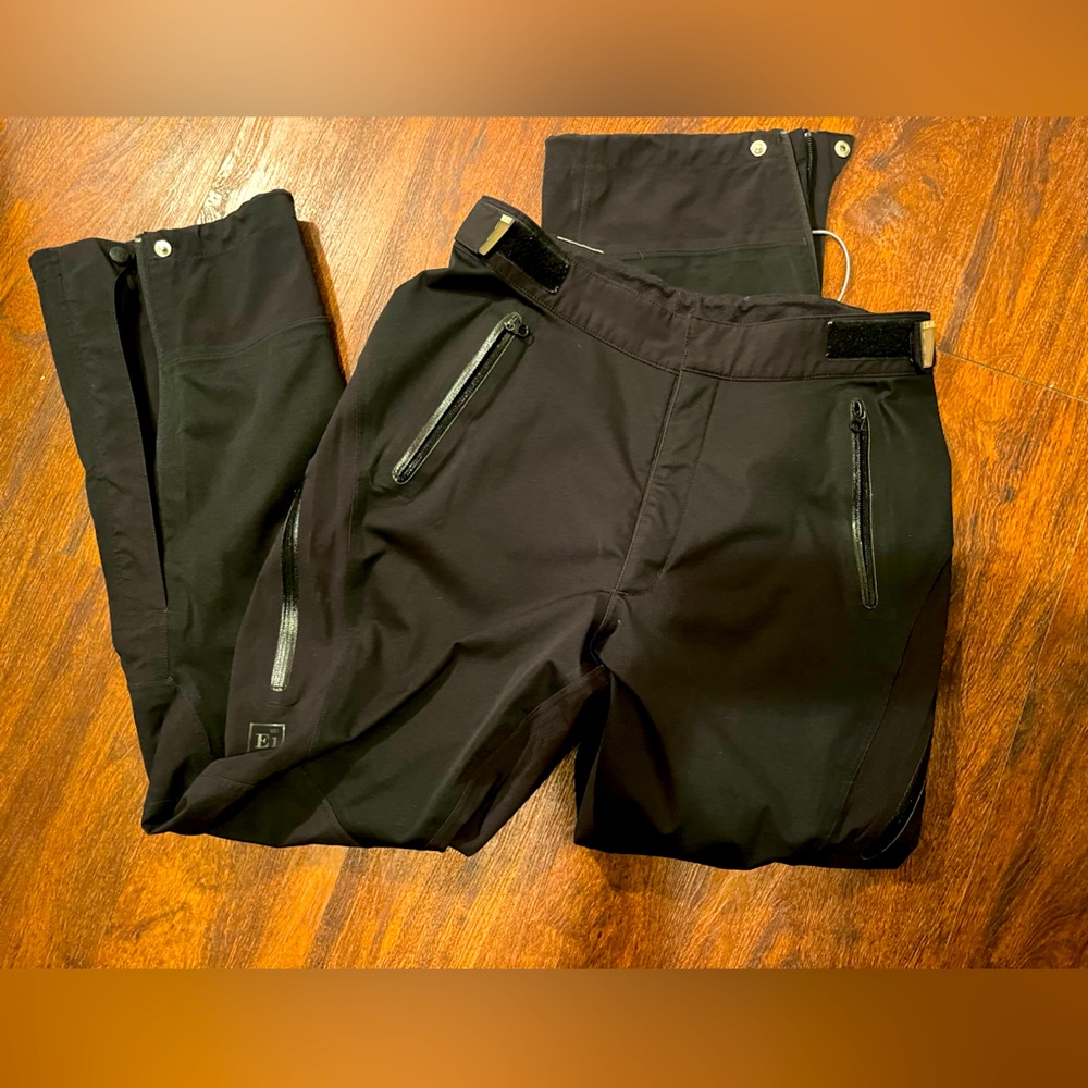 REI non-insulated snow pants or rain pants